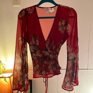 Red floral blouse